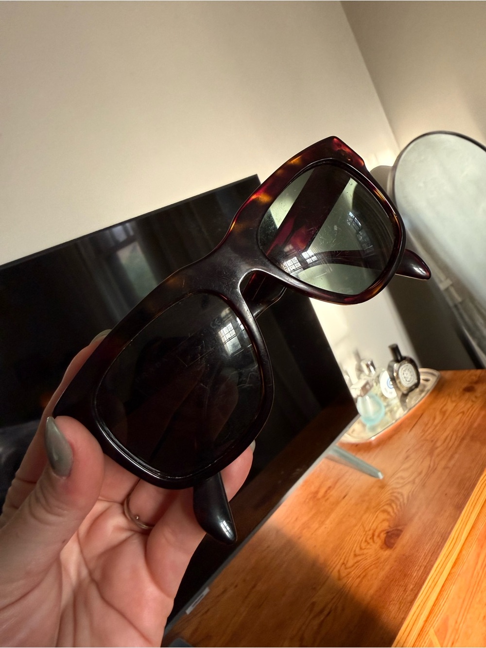 Prada Tortoiseshell Frame Sunglasses with Dark Lenses